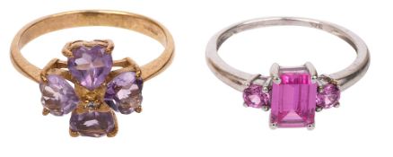 An amethyst ring and a pink sapphire white gold ring