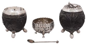 A 19th century Indian silver mounted salt and pepper pot, salt,spoon