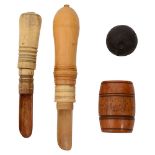 Two early 19th century turned pocket apple corers and a small ebony puzzle ball