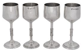 A set of four modernist silver goblets