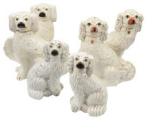 Three pairs of 19th century Staffordshire pottery spaniels