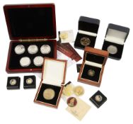 A selection of cased gold and silver proof coins