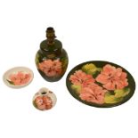 Four pieces of Moorcroft in Hibiscus pattern