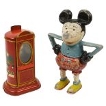 A Mickey Mouse money box together with a German chocolate dispenser box, 1930s