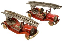 Two Mettoy tin plate fire engines