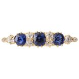 A sapphire and diamond-set brooch