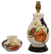 A Moorcroft 'Sandringham Bouquet' pattern table lamp and vase