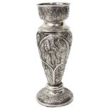 A small silver Indian vase