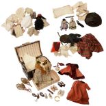 A collection of late 19th and later dolls clothing and dolls