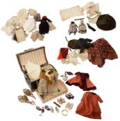 A collection of late 19th and later dolls clothing and dolls