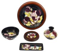 A group of five Moorcroft 'Magnolia Dark Blue' pattern pieces