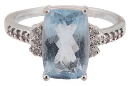 An aquamarine and diamond-set ring