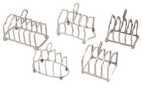 Five George V silver toast racks