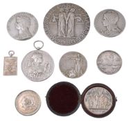A collection of mostly early 20th century silver prize and commemorative medals
