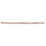 A diamond-set cluster and 18ct gold flexible bracelet