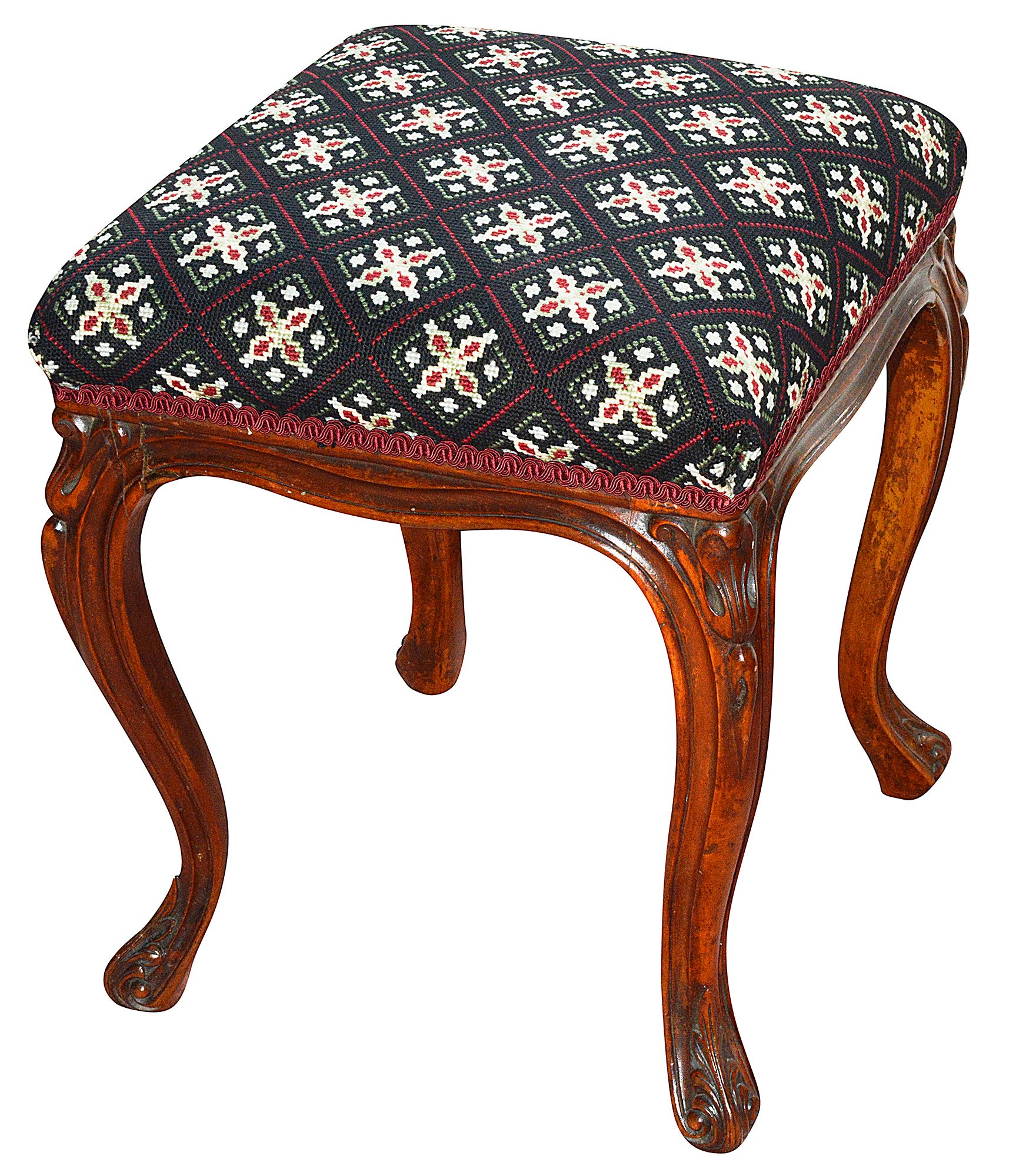 A Victorian walnut footstool