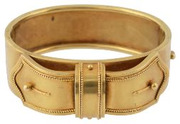 A mid Victorian yellow gold oval hinged bangle