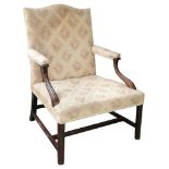 A George III mahogany and upholstered 'Gainsborough' armchair