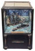 A cased scatch built automaton diorama of ships and planes