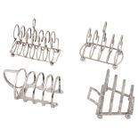 Four Edwardian and later silver toast racks