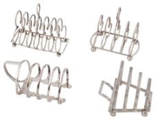 Four Edwardian and later silver toast racks