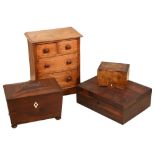 A Regency rosewood sarcophagus tea caddy, an oak tabletop chest of drawers and other boxes