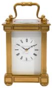A large Matthew Norman brass four glass carriage clock