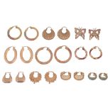 Nine pairs of mostly 9ct gold continental hoop earrings