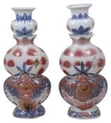 A near pair of Chinese blue and white and copper underglaze vases, late 19th/early 20th century