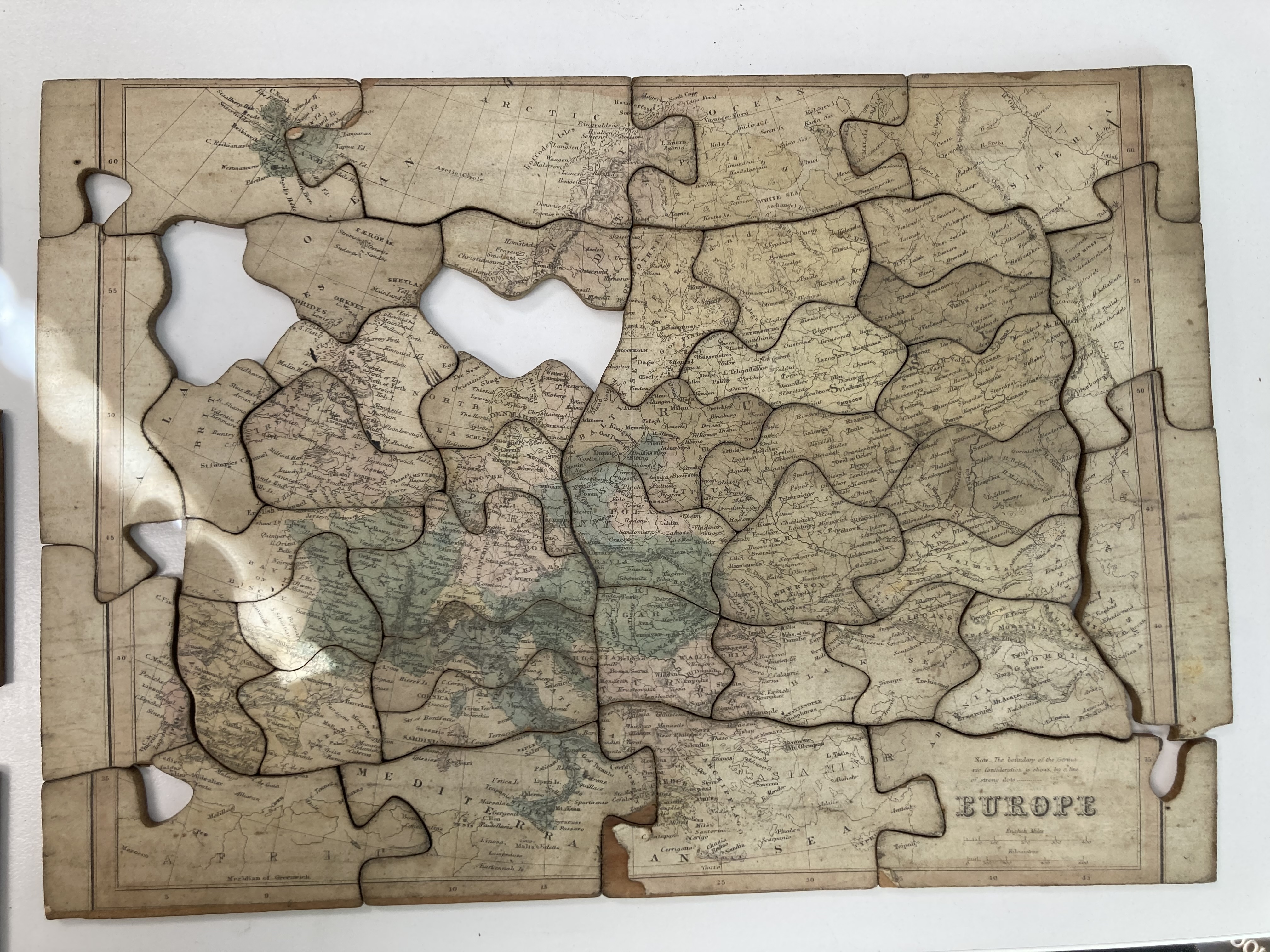Four mid 19th century dissected wooden jigsaw puzzles and a set of fifteen Victorian printed alphabe - Image 3 of 8
