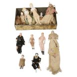 A collection of twelve miniature bisque / porcelain headed dolls, 19th and later