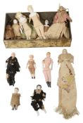 A collection of twelve miniature bisque / porcelain headed dolls, 19th and later