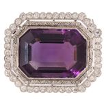 An impressive amethyst and diamond-set brooch