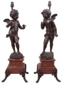 A pair of late 19th century French spelter figural lamps
