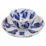 A late 19th century Chinese blue and white porcelain Immortals tea bowl and saucer