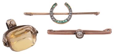 An emerald and diamond-set horseshoe brooch, a citrine fob seal and a bar brooch