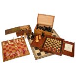 A collection of 19th century and later chess sets and related items