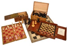 A collection of 19th century and later chess sets and related items