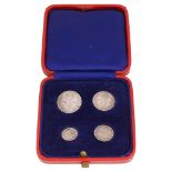 A cased set of four silver George VI Maundy coins, 1944