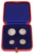 A cased set of four silver George VI Maundy coins, 1944