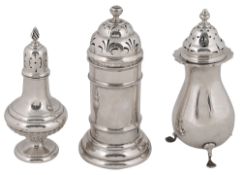 A George V silver lighthouse silver sugar caster and two others