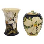 Two pieces of Moorcroft including; a 'Mississippi Magnolia' vase and a 'Paradise Flower' ginger jar,