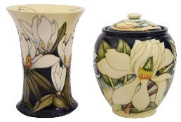 Two pieces of Moorcroft including; a 'Mississippi Magnolia' vase and a 'Paradise Flower' ginger jar,