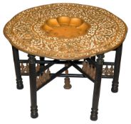 An Indian brass tray on stand occasional table