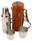 A stitched tan leather cased chrome plated picnic Thermos flask