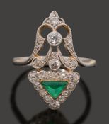 An unusual early 20th century emerald and diamond-set ring