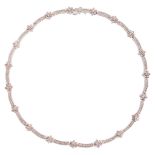 A diamond-set flexible link necklace