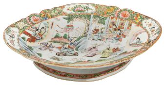 A large late 19th Chinese Canton famille rose footed dish