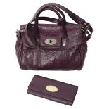 A Mulberry classic mini Bayswater satchel in plum and a purse