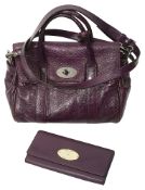 A Mulberry classic mini Bayswater satchel in plum and a purse